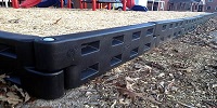 black playground border or plastic border timber